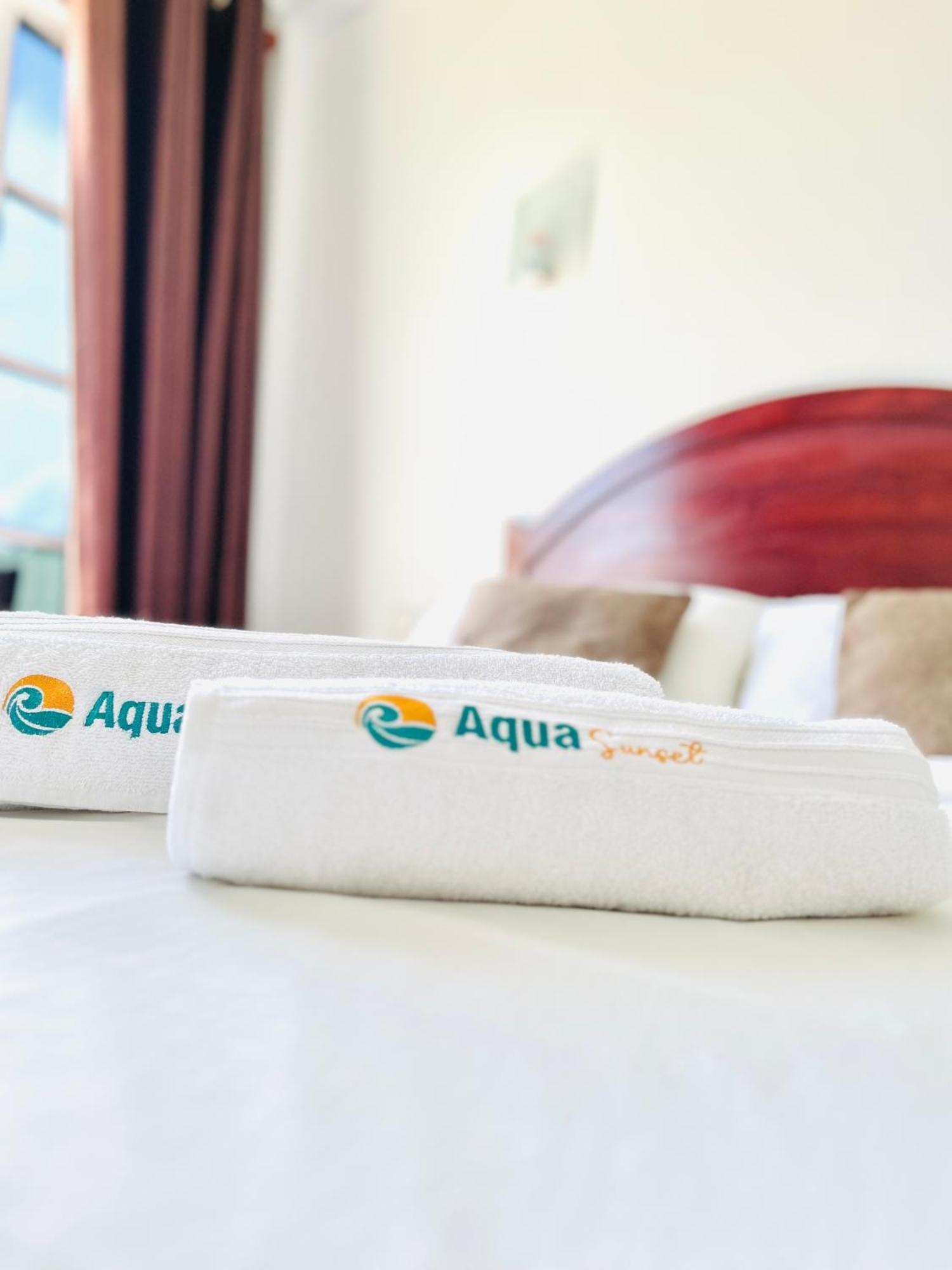 Aqua Sunset Hotel Gulhi Bagian luar foto